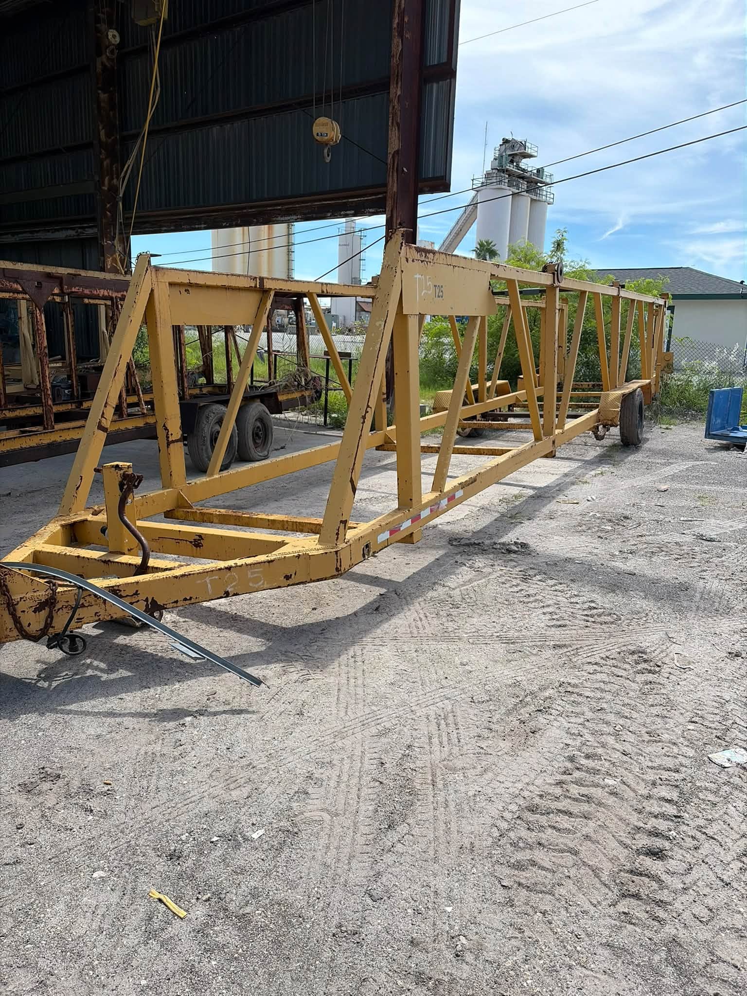 Yellow pipe reel trailer